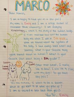 Handwritten pen pal letter. Includes cartoons of dogs and colorful designs around the border.