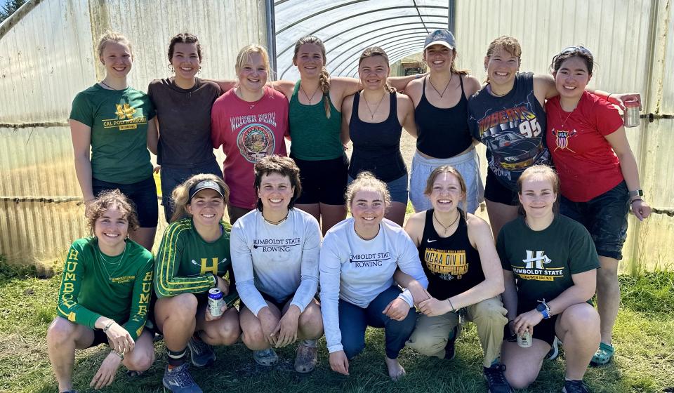 Women's rowing team pose in front of the greenhouse at Potawot. They volunteered together at Serve-a-Thon (Spring 2024)